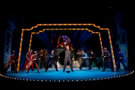 Edward Watts and the cast of GUYS & DOLLS