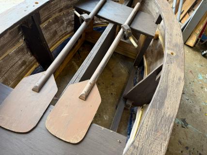 Interior of the boat with the included oars.