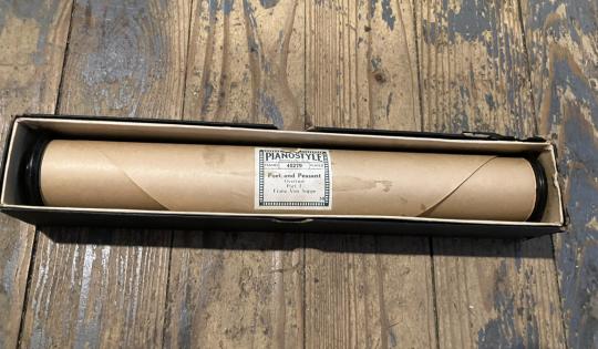 player piano roll in its original box