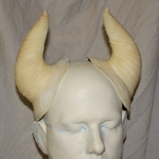 20.5cm (8") Beast Horn props on a plastic human head