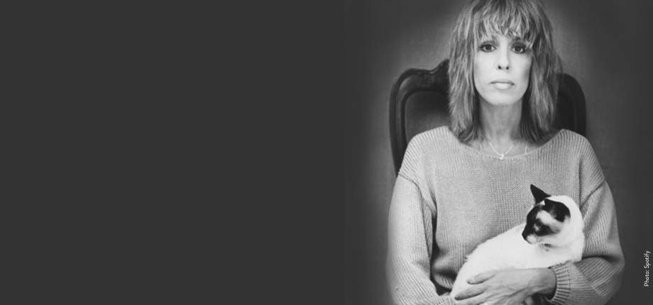 photo of Cynthia Weil seated while holding a cat